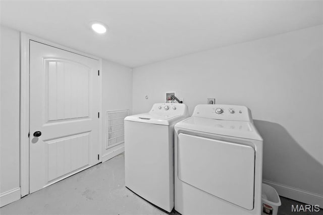 1326 Graham St, Saint Louis, MO 63139 - laundry area with independent washer and dryer and recessed lighting