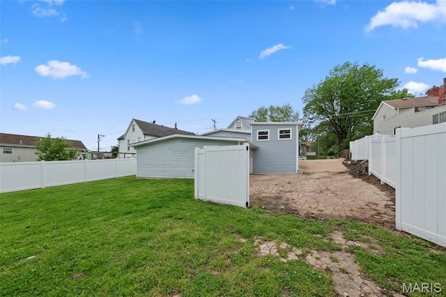 1326 Graham St, Saint Louis, MO 63139 - view of yard featuring an outdoor structure and a storage unit