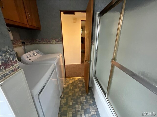805 Willoway Ave, East Alton, IL 62024 - clothes washing area with cabinet space and washing machine and dryer