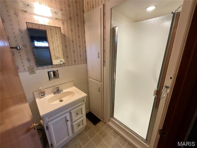 805 Willoway Ave, East Alton, IL 62024 - full bath with wallpapered walls, a shower stall, and vanity