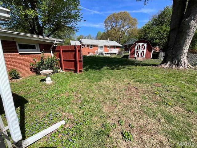 805 Willoway Ave, East Alton, IL 62024 - view of yard featuring a shed and an outdoor structure