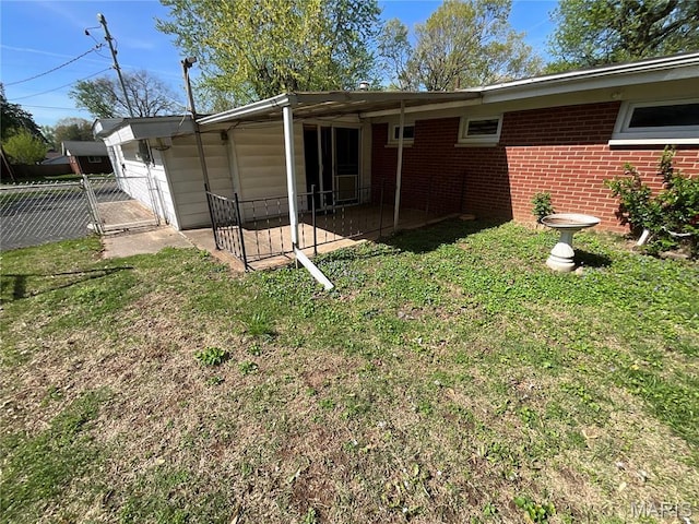 805 Willoway Ave, East Alton, IL 62024 - rear view of property with a patio area, brick siding, and a gate