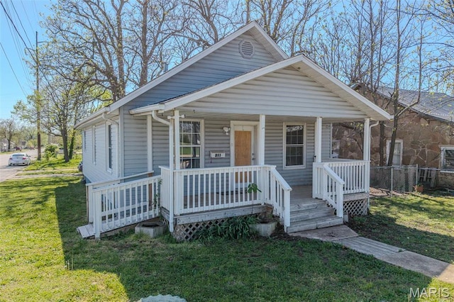view of front facade with a porch and a front yard