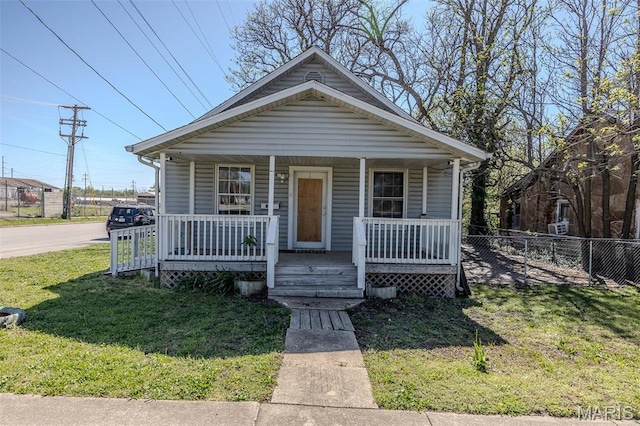 shotgun-style home with a porch