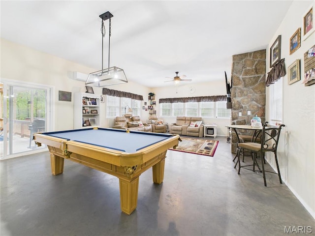 recreation room with finished concrete flooring, pool table, a ceiling fan, and baseboards