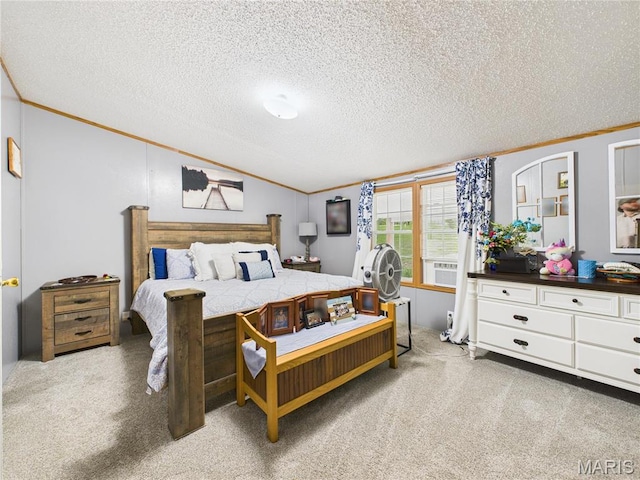 bedroom featuring ornamental molding, lofted ceiling, a textured ceiling, and carpet flooring