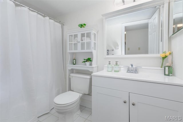 9162 Eager Rd, Saint Louis, MO 63144 - bathroom with tile patterned floors, toilet, vanity, and a shower with shower curtain