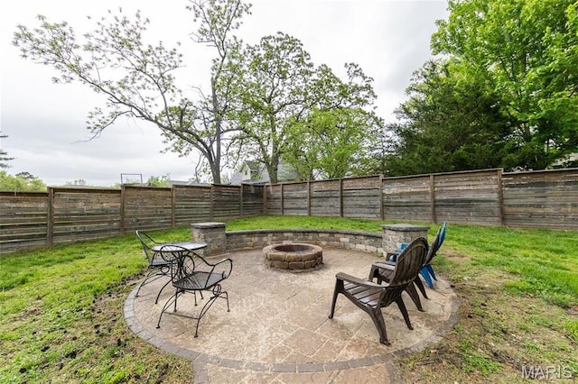 view of patio featuring a fire pit