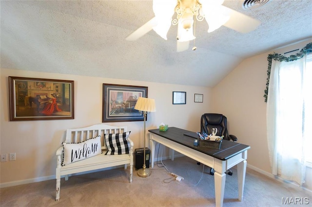 carpeted office space with a textured ceiling, baseboards, lofted ceiling, and a ceiling fan