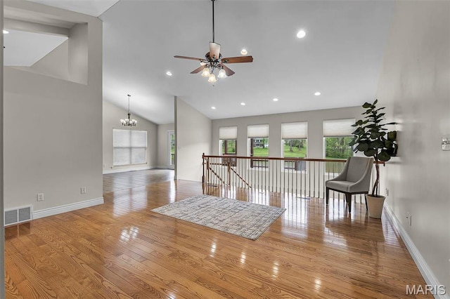 2600 Cobblestone Ct, Cape Girardeau, MO 63701 - empty room with a ceiling fan, wood finished floors, a chandelier, baseboards, and recessed lighting
