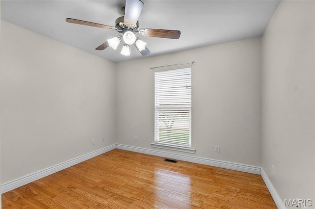 2600 Cobblestone Ct, Cape Girardeau, MO 63701 - unfurnished room with light wood-style floors, baseboards, and a ceiling fan