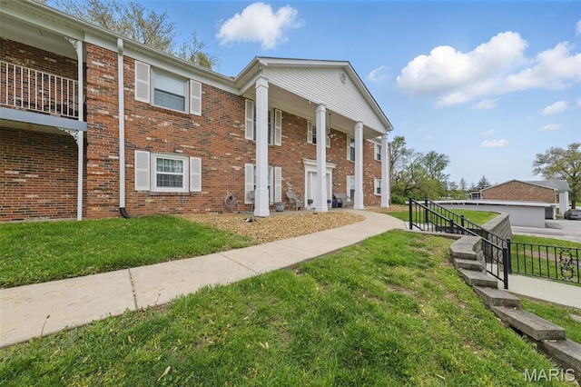 3214 Roger Williams Dr Unit D, Bridgeton, MO 63044 - view of side of property with brick siding