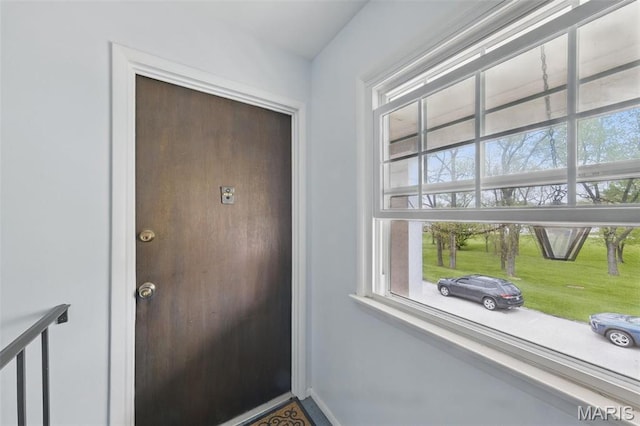 3214 Roger Williams Dr Unit D, Bridgeton, MO 63044 - doorway to outside featuring healthy amount of natural light and baseboards