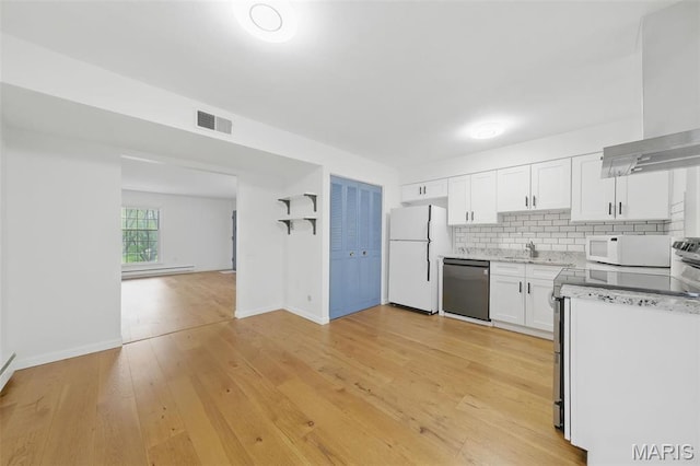 3214 Roger Williams Dr Unit D, Bridgeton, MO 63044 - kitchen featuring white appliances, white cabinetry, light wood-type flooring, backsplash, and wall chimney range hood