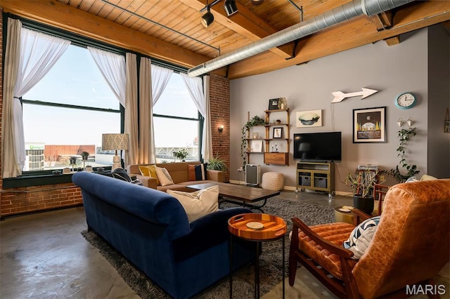 901 Washington Ave Unit 411, Saint Louis, MO 63101 - living area featuring concrete floors, wood ceiling, and beam ceiling