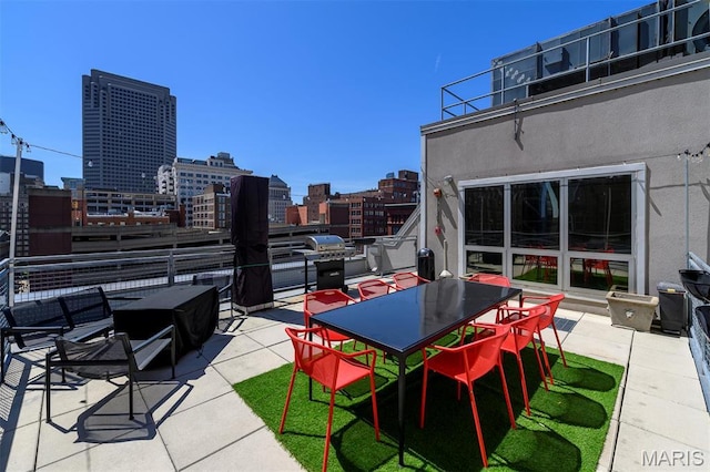 901 Washington Ave Unit 411, Saint Louis, MO 63101 - view of patio featuring a view of city and grilling area