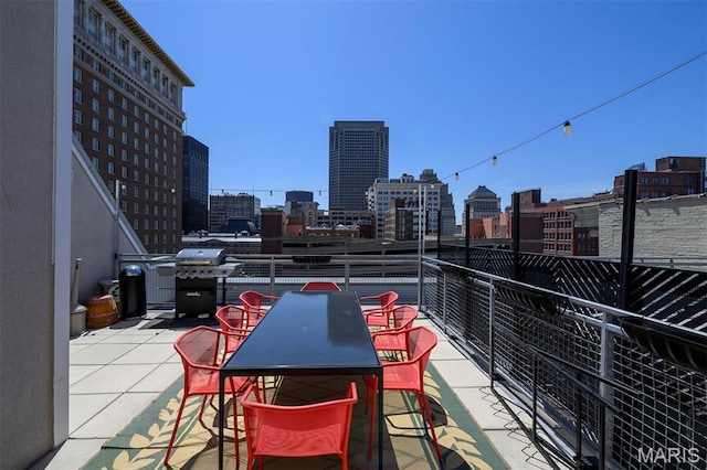 901 Washington Ave Unit 411, Saint Louis, MO 63101 - balcony with a skyline view and grilling area