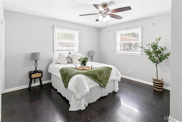 1404 Lemon St, Highland, IL 62249 - bedroom with ceiling fan and dark wood-style flooring