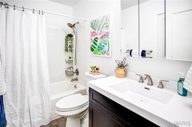 1404 Lemon St, Highland, IL 62249 - full bathroom with vanity, shower / bath combo with shower curtain, and wood finished floors