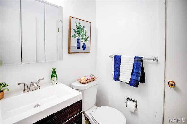 1404 Lemon St, Highland, IL 62249 - bathroom with toilet and vanity