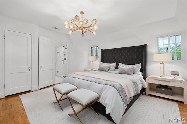 2 Northcote Rd, Saint Louis, MO 63144 - bedroom featuring a chandelier and wood finished floors