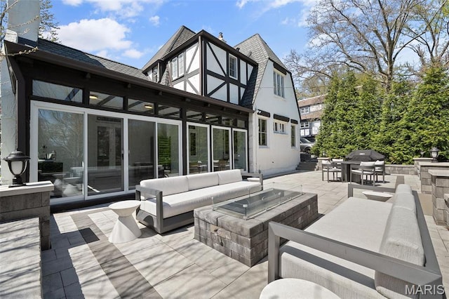2 Northcote Rd, Saint Louis, MO 63144 - wooden deck featuring outdoor lounge area, grilling area, a patio area, a sunroom, and outdoor dining area