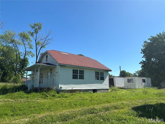 6966 Front St, Barnhart, MO 63012 - rear view of property with covered porch