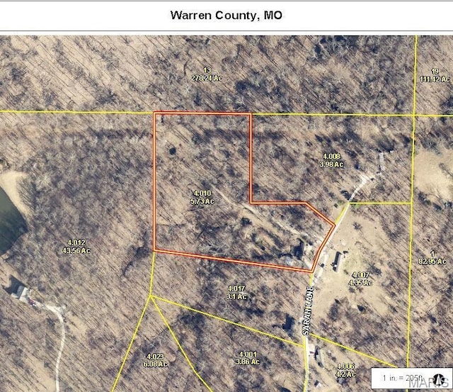 aerial map of property and surrounding area featuring property parcel outlined