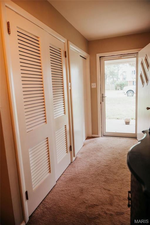 entryway featuring carpet