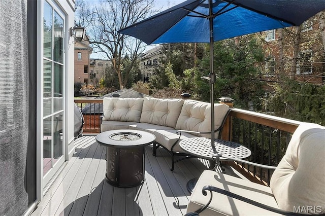 14 Brighton Way, Clayton, MO 63105 - wooden terrace featuring an outdoor living space with a fire pit