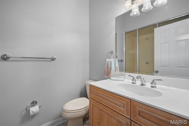 14 Brighton Way, Clayton, MO 63105 - bathroom with toilet and vanity