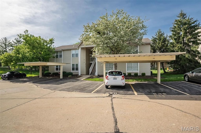 846 Sugar Valley Ct Unit 4, Saint Peters, MO 63376 - view of building exterior with covered and uncovered parking and stairway