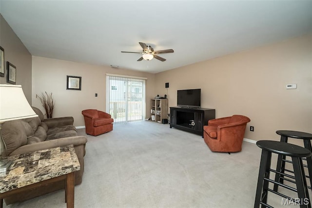 846 Sugar Valley Ct Unit 4, Saint Peters, MO 63376 - living room featuring ceiling fan, light carpet, and baseboards
