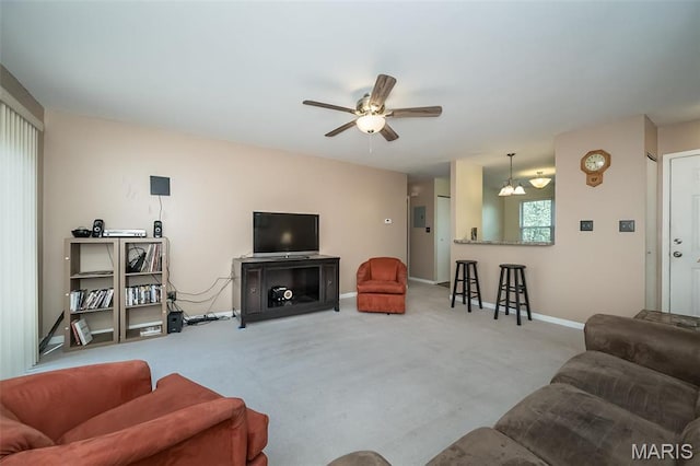 846 Sugar Valley Ct Unit 4, Saint Peters, MO 63376 - carpeted living area with ceiling fan and baseboards