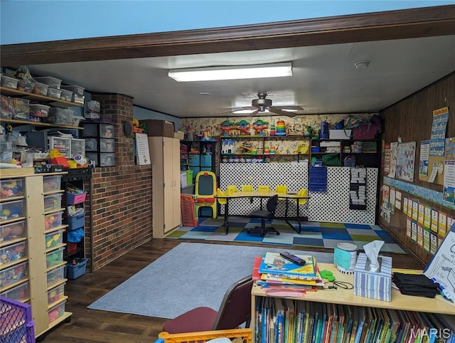 705 Burks Rd, Farmington, MO 63640 - game room with ceiling fan, wood finished floors, wooden walls, and brick wall