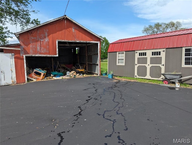 705 Burks Rd, Farmington, MO 63640 - detached garage with a storage unit