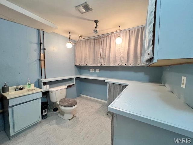 laundry area featuring a sink