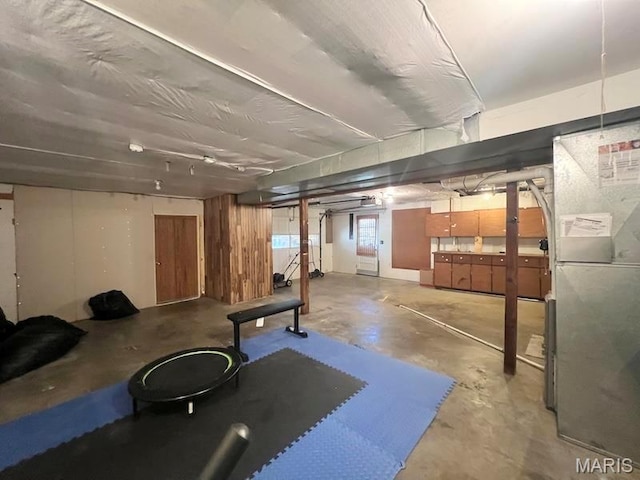 basement featuring heating unit