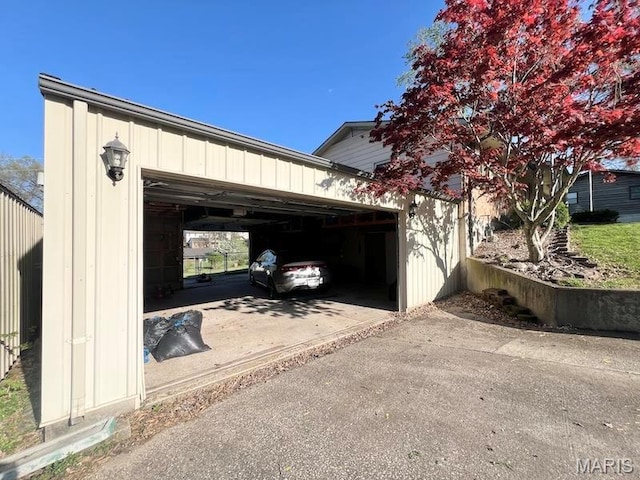 garage featuring driveway
