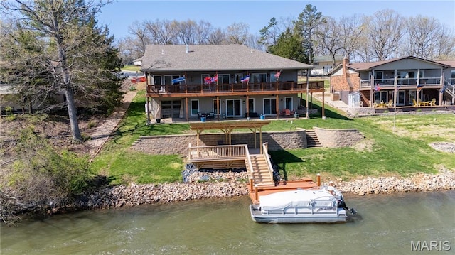1753 Rue Marseilles, Bonne Terre, MO 63628 - rear view of house with stairs, a yard, and a deck with water view