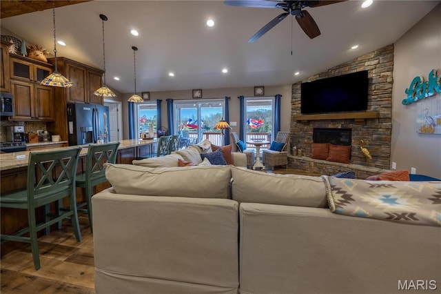 1753 Rue Marseilles, Bonne Terre, MO 63628 - living area with vaulted ceiling, a ceiling fan, wood finished floors, recessed lighting, and a fireplace