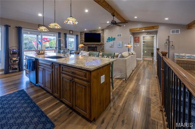 1753 Rue Marseilles, Bonne Terre, MO 63628 - kitchen with a sink, open floor plan, dark wood-style flooring, a stone fireplace, and recessed lighting