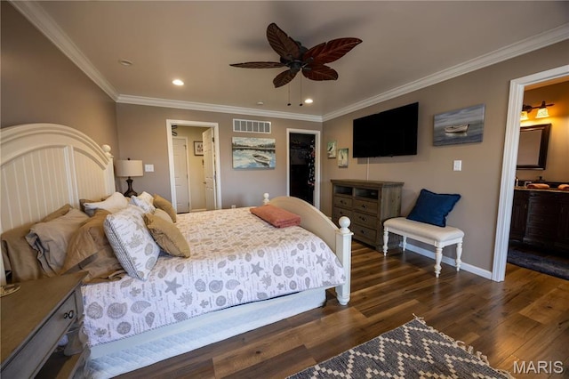 1753 Rue Marseilles, Bonne Terre, MO 63628 - bedroom featuring a walk in closet, wood finished floors, recessed lighting, ornamental molding, and baseboards