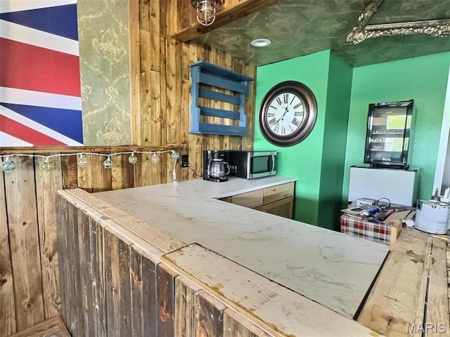 1753 Rue Marseilles, Bonne Terre, MO 63628 - bar featuring stainless steel microwave and wooden walls