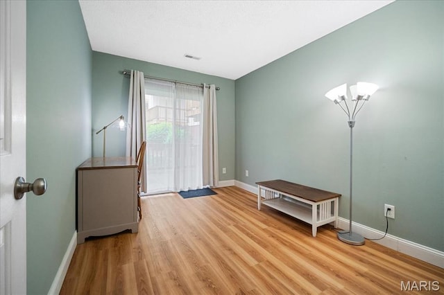 9005 Cardinal Ter, Saint Louis, MO 63144 - miscellaneous room featuring baseboards and wood finished floors