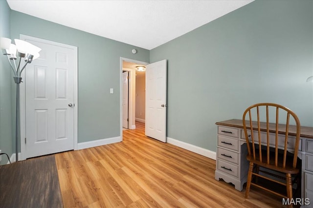 9005 Cardinal Ter, Saint Louis, MO 63144 - office featuring baseboards and light wood-style floors