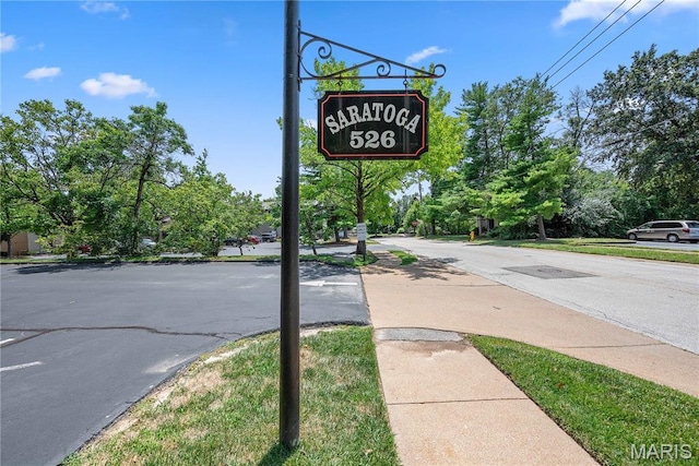 526 Sarah Ln Unit 27, Saint Louis, MO 63141 - view of asphalt road featuring sidewalks and traffic signs