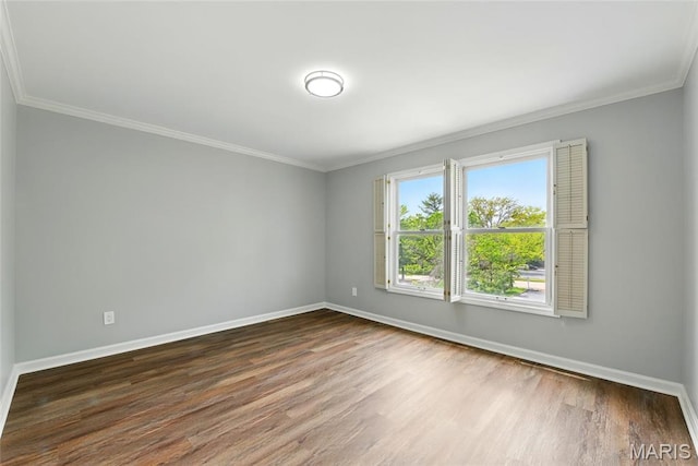 526 Sarah Ln Unit 27, Saint Louis, MO 63141 - spare room with ornamental molding, baseboards, and wood finished floors