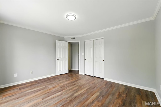 526 Sarah Ln Unit 27, Saint Louis, MO 63141 - unfurnished bedroom with wood finished floors, baseboards, a closet, and crown molding