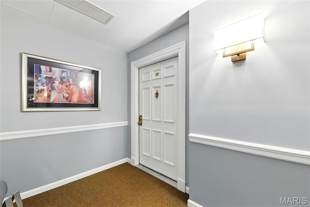 526 Sarah Ln Unit 27, Saint Louis, MO 63141 - doorway to outside with dark colored carpet and baseboards